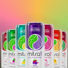Assorted drinks with colorful labels on a gradient background