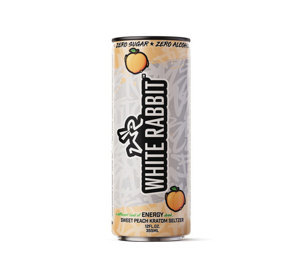 A can of White Rabbit Sweet Peach Kratom energy drink with the product name and flavor clearly displayed, along with icons indicating zero sugar and zero alcohol.